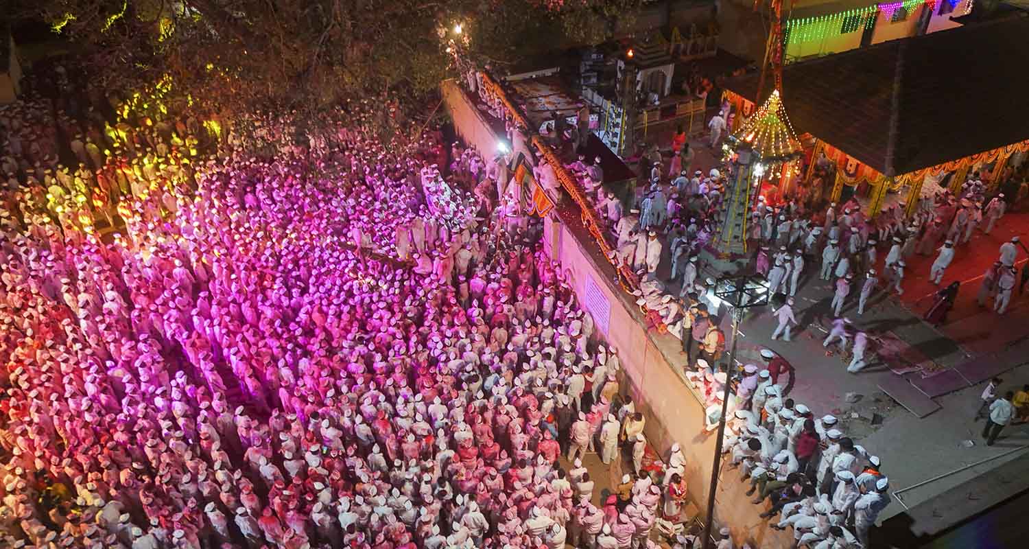 Satara: Devotees attend the Bagad Rath Yatra festival at Bavdhan village in Satara district, on Wednesday. During the festival the sacred Bagad or chariot of God with stone wheels is pulled by eight bullocks out of hundreds brought from various parts of Maharashtra.
