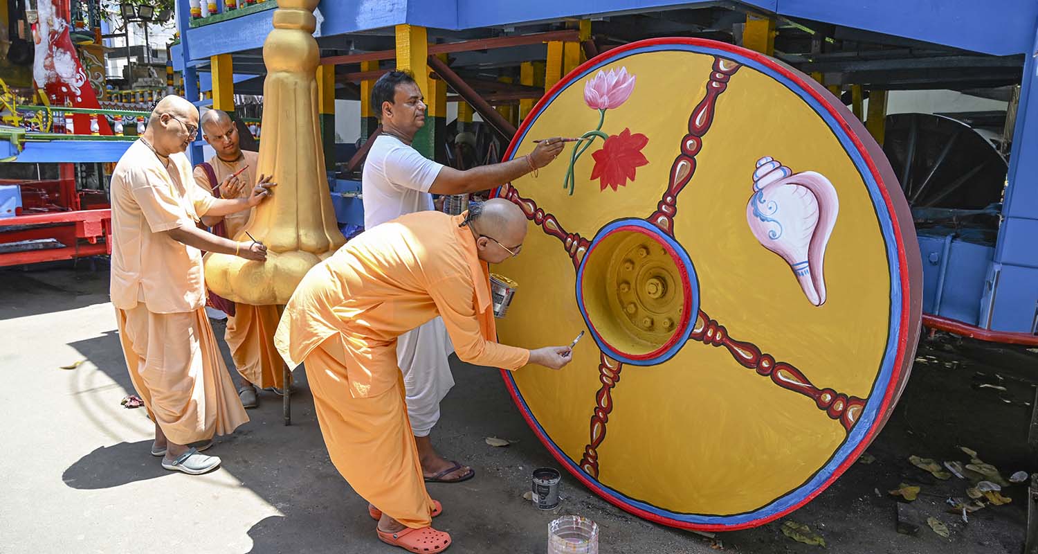 Kolkata: ISKCON (International Society for Krishna Consciousness) monks paint the Rath (chariot) ahead of the Rath Yatra festival, in Kolkata, on Tuesday.