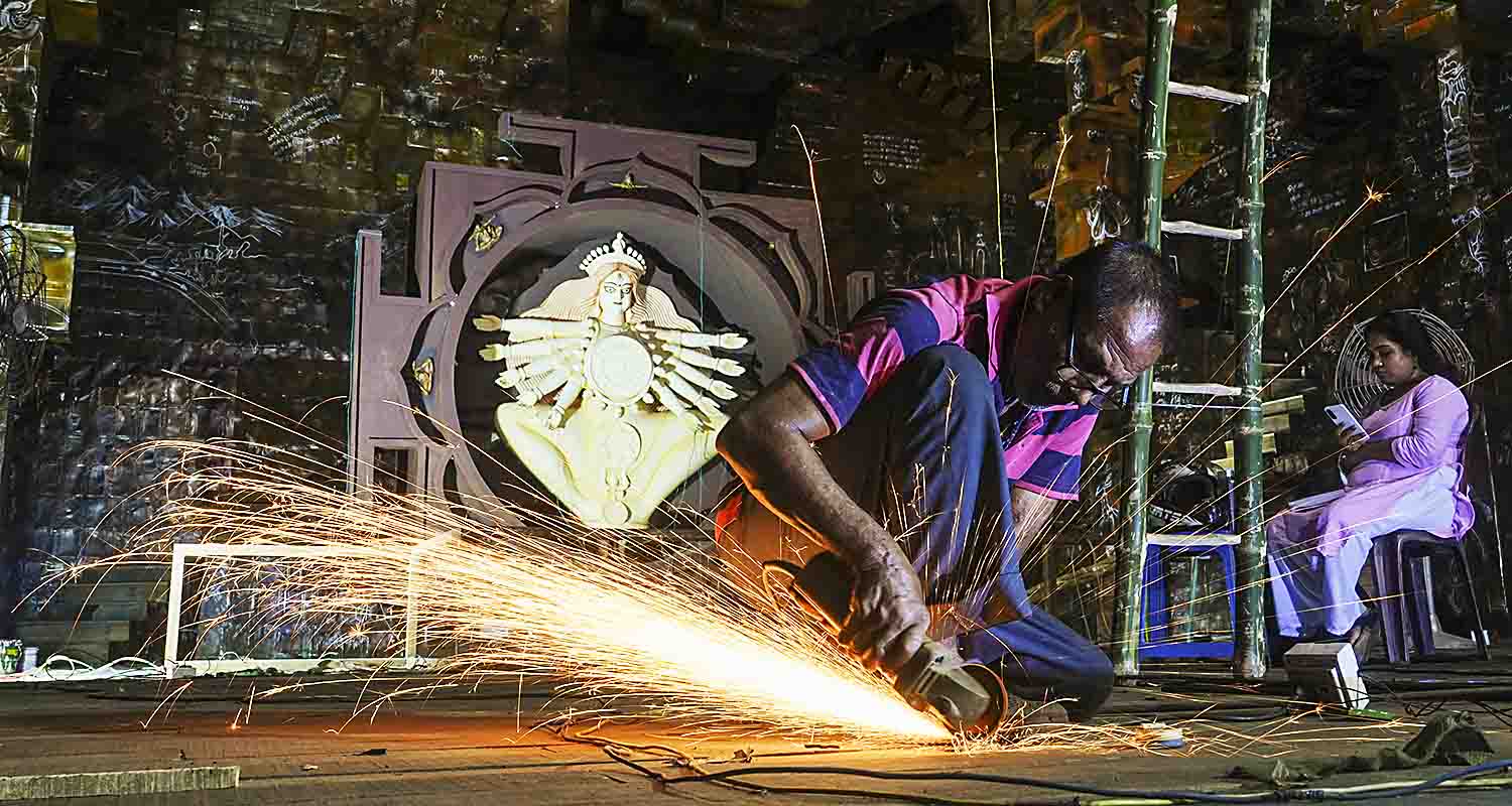 Gurugram: An artisan works on an idol of Goddess Durga ahead of the Durga Puja festival, in Gurugram, Haryana, on Friday.