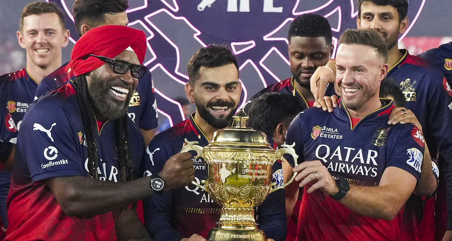 Ahmedabad: Royal Challengers Bengaluru’s Virat Kohli and former cricketers Chris Gayle and AB de Villiers celebrate with the championship trophy after the presentation ceremony of the Indian Premier League 2025 final, at the Narendra Modi Stadium, in Ahmedabad.