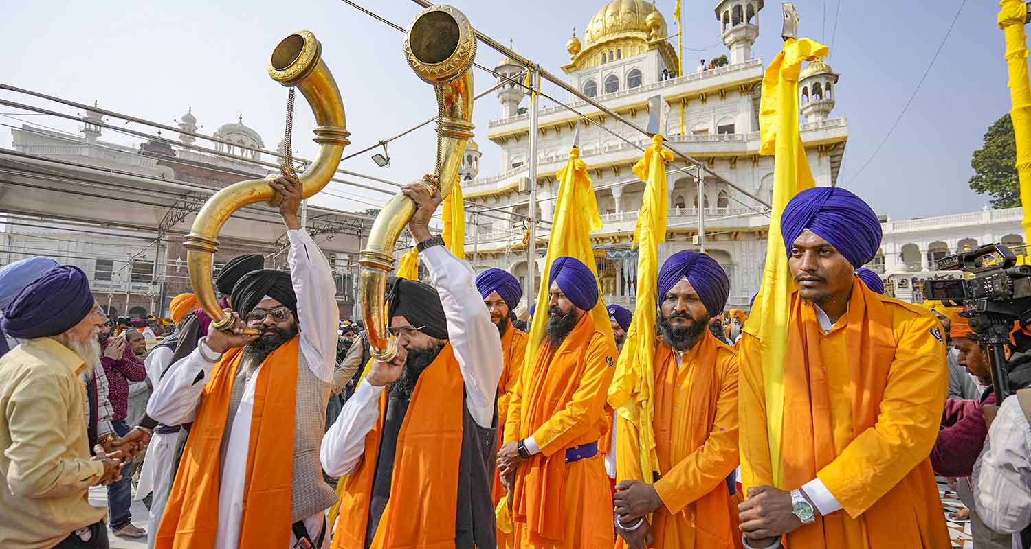 Members of the Sikh community take part in a ‘Nagar Kirtan’ procession commemorating the 350th anniversary of the martyrdom of the 9th Sikh Guru, Guru Tegh Bahadur, at Golden Temple in Amritsar, on Monday.