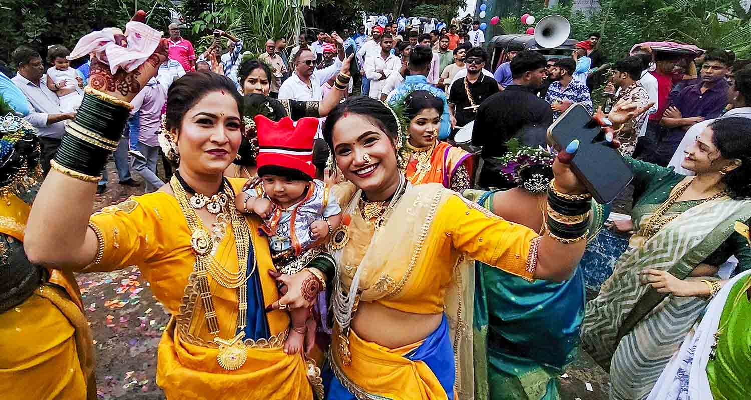Navi Mumbai: Women from Koli community dressed in traditional attire take part in a procession as part of Narali Purnima celebration, in Navi Mumbai, on Friday.