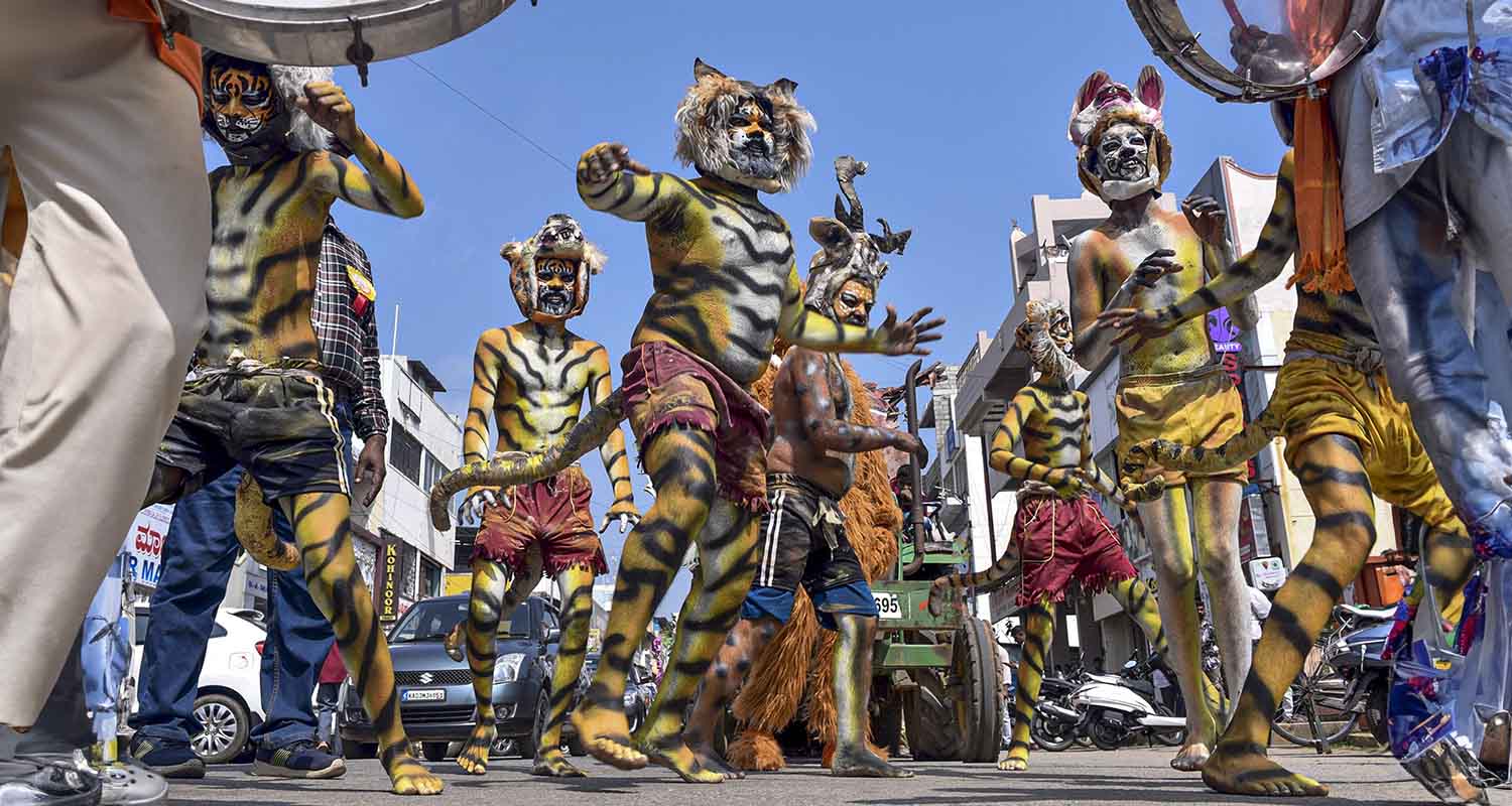Students take part in a cleanliness drive at Juhu beach, in Mumbai, on Saturday.
