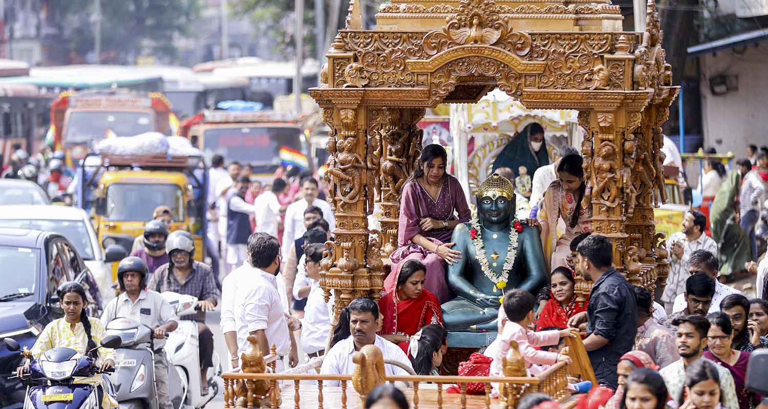 People take part in a procession, from Begum Bazar to Nampally Exhibition Grounds, on the 2625th birth anniversary of Lord Mahavir to celebrate Mahavir Jayanti, in Hyderabad, Telangana, on Tuesday.