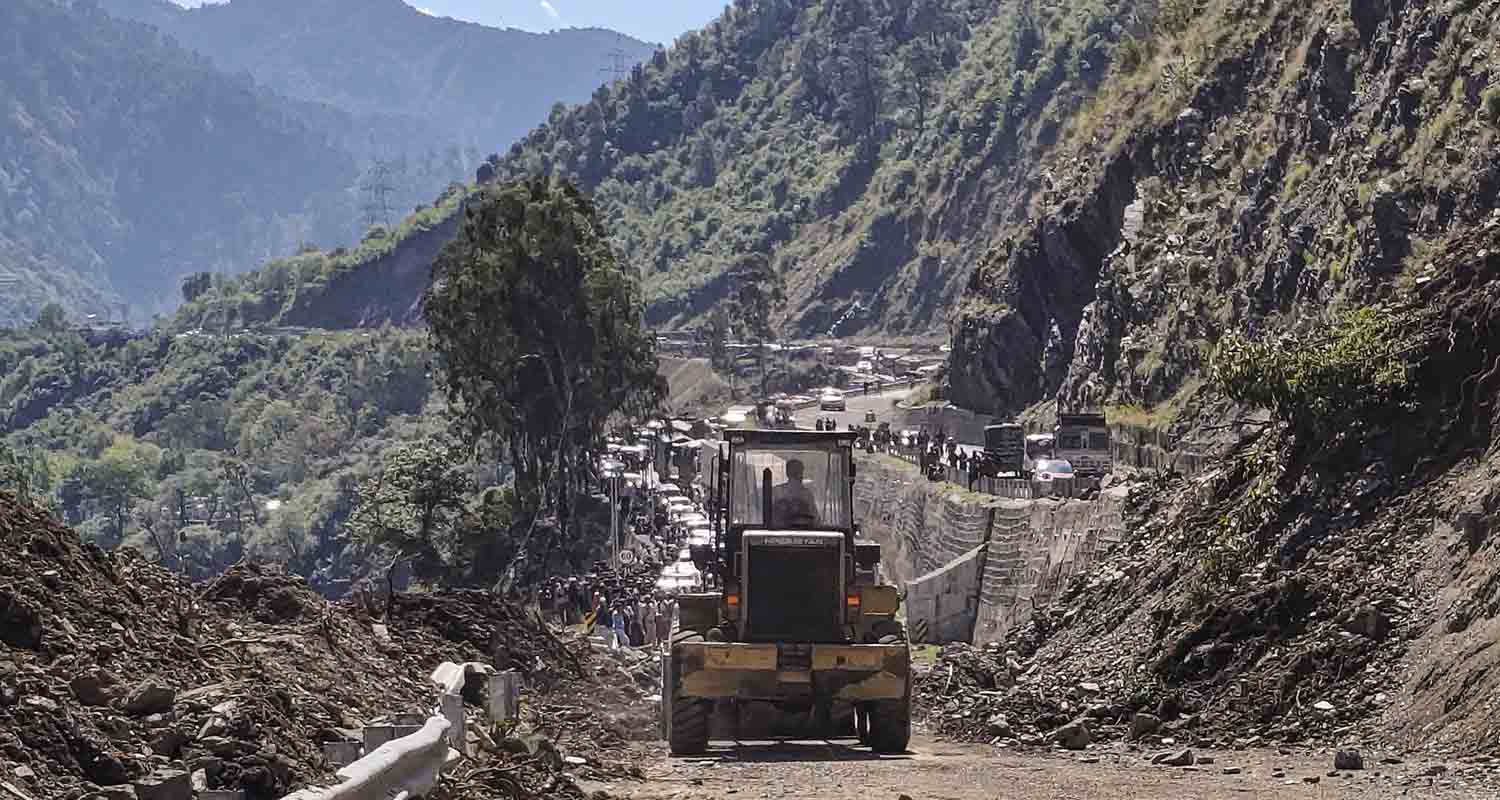 A view of traffic at the Jammu-Srinagar National Highway after a massive landslide between Karol Bridge and Chanderkote blocks a section of the highway, in Ramban on Monday.
