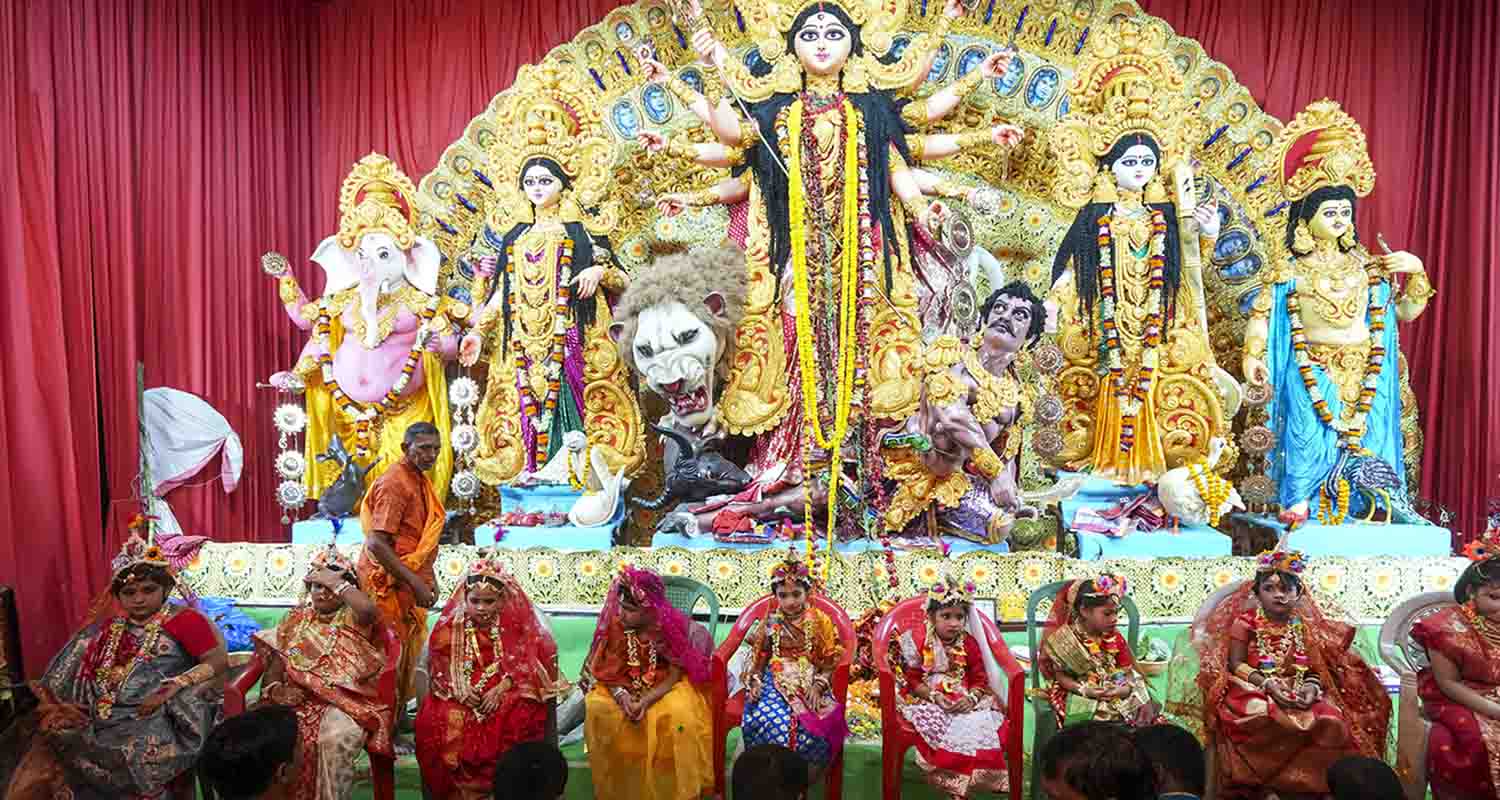 Kolkata: People worship girls during 'Kumari Puja' on 'Maha Ashtami' as part of the Durga Puja festival celebrations, in Kolkata, West Bengal, on Tuesday.