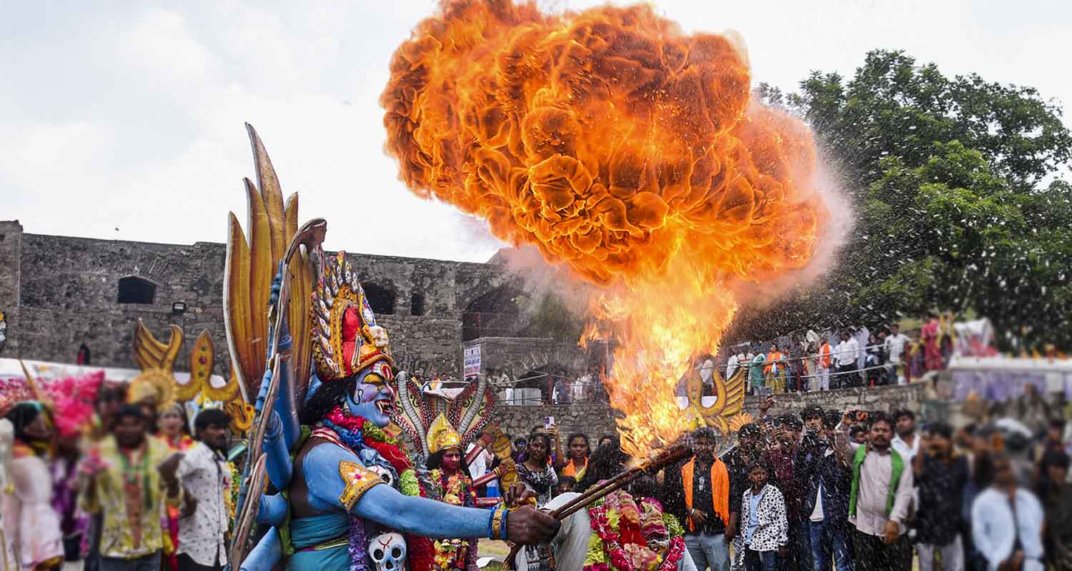 Hyderabad: Women carry Bonam pots during the Ashada Masam Bonalu celebrations at Golconda Fort, in Hyderabad, Telangana.