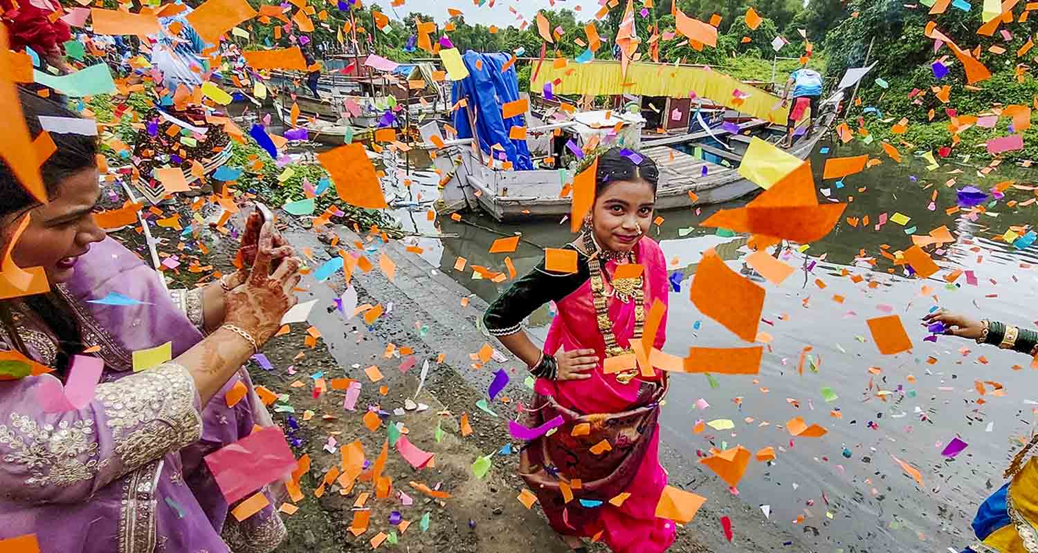 Navi Mumbai: Women from Koli community dressed in traditional attire take part in a procession as part of Narali Purnima celebration, in Navi Mumbai, on Friday.