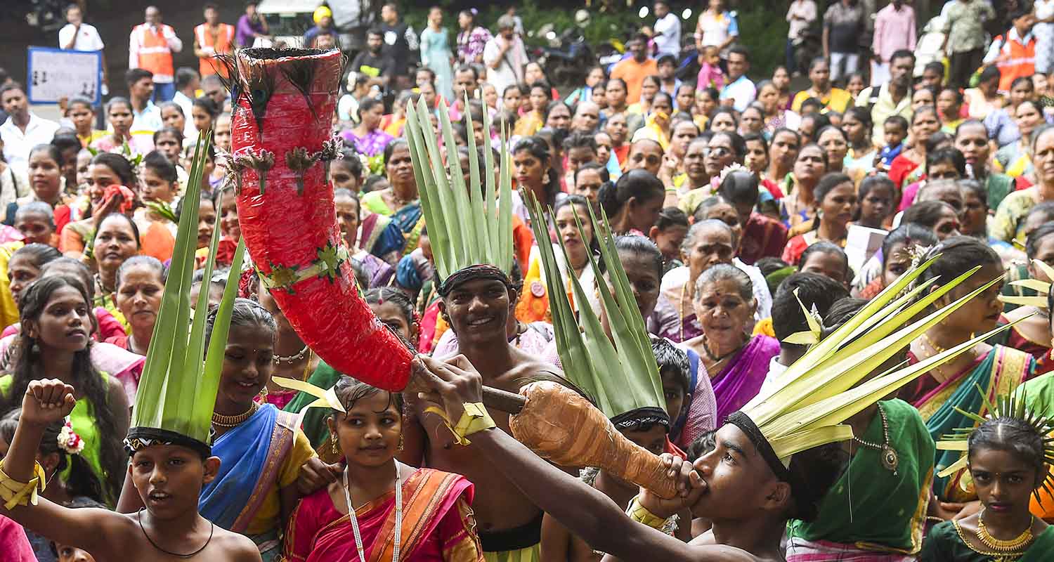 Members of the tribal community perform traditional dance to celebrate the International Day of the World’s Indigenous Peoples, at Aarey colony, in Mumbai, on Saturday.