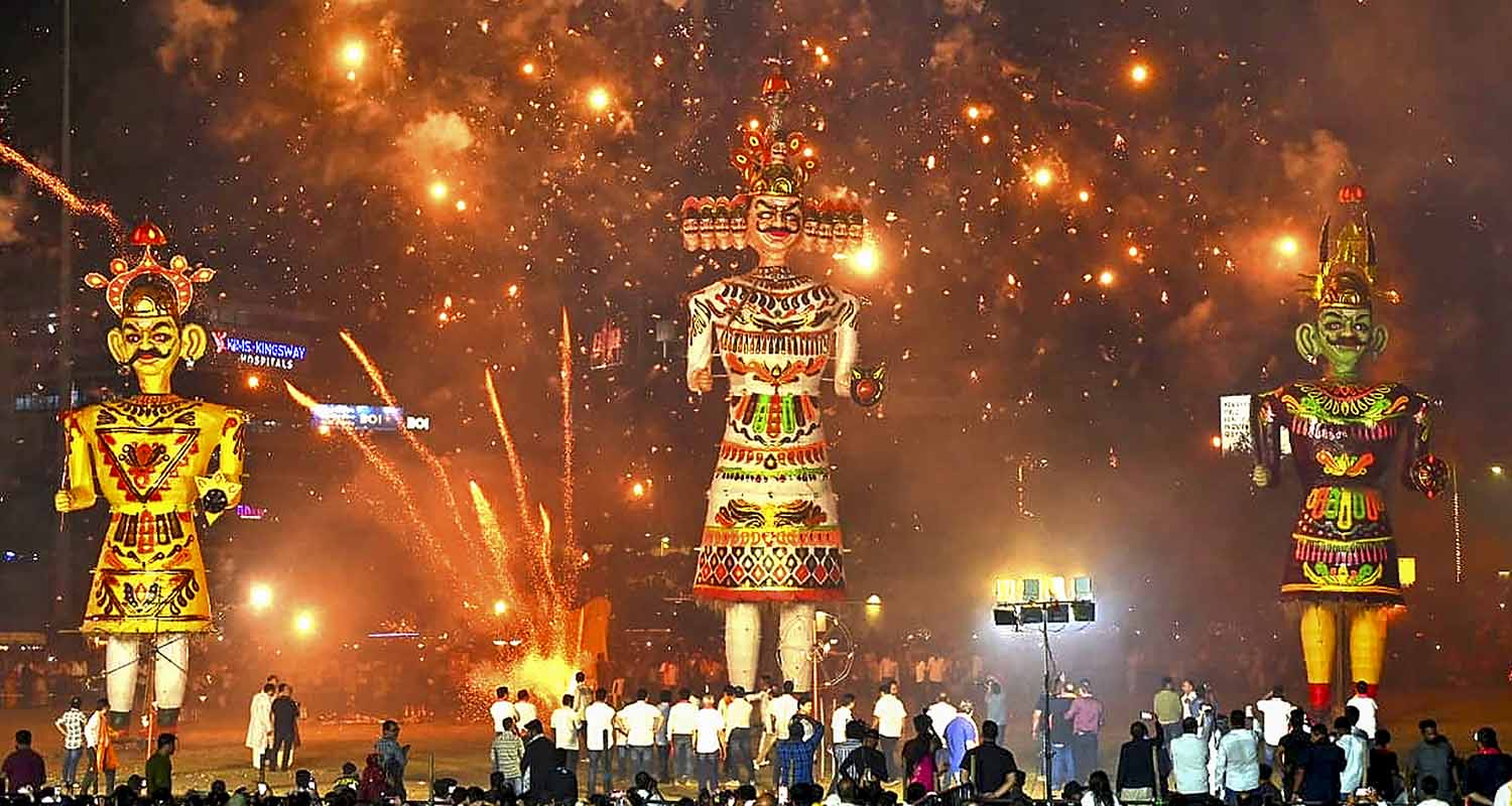 Nagpur: Fireworks explode behind effigies of demon king 'Ravana', his brother 'Kumbhakarna' and son 'Meghnath' during the Dussehra festival celebration, in Nagpur, Maharashtra, on Thursday. Nagpur: Fireworks explode behind effigies of demon king 'Ravana', his brother 'Kumbhakarna' and son 'Meghnath' during the Dussehra festival celebration, in Nagpur, Maharashtra, on Thursday.