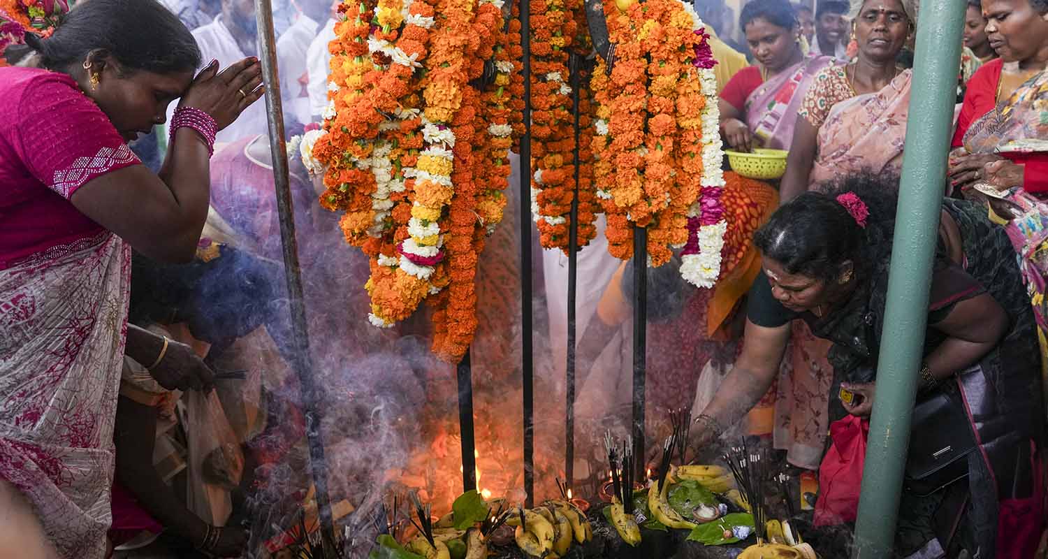 A devotee with pierced back takes part in a procession on the Panguni Uthiram festival, honouring the Hindu God Murugan in the Tamil month of Panguni, in New Delhi, on Wednesday.