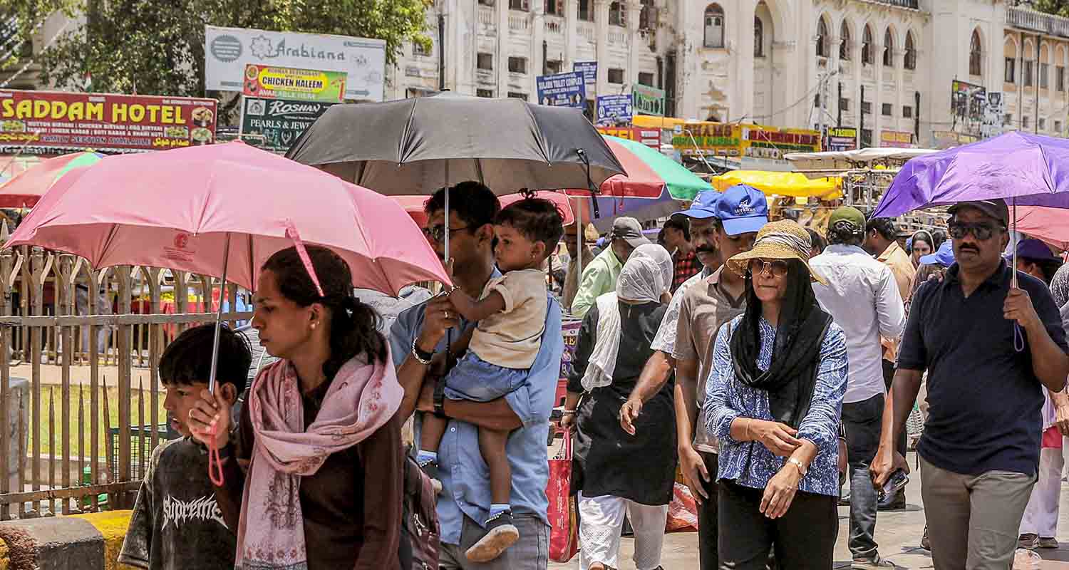 Women cover themselves on a hot summer day, in Jaipur, Rajasthan, on Tuesday.
