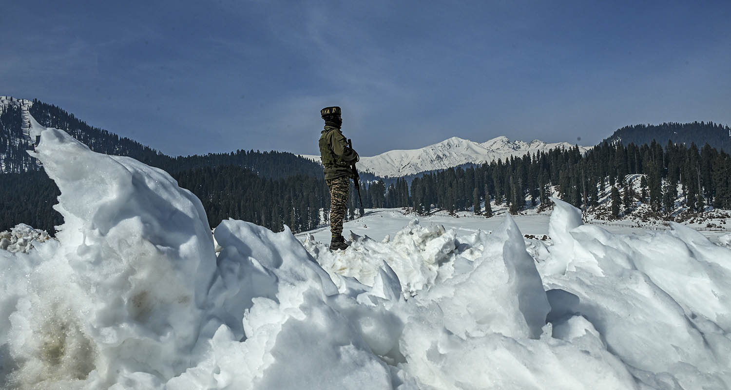 A man walks through a snow-covered area, at Doodhpathri area in Budgam, Tuesday, Feb. 17, 2026. 14 tourist destinations in the Union Territory, which were closed in April last year following the Pahalgam terror attack, were opened.